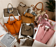 Assorted leather handbags with boxes