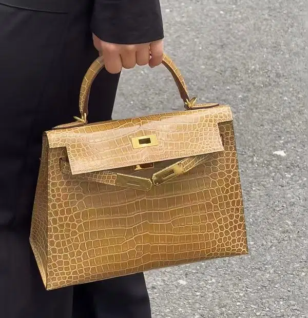 Gold crocodile leather handbag