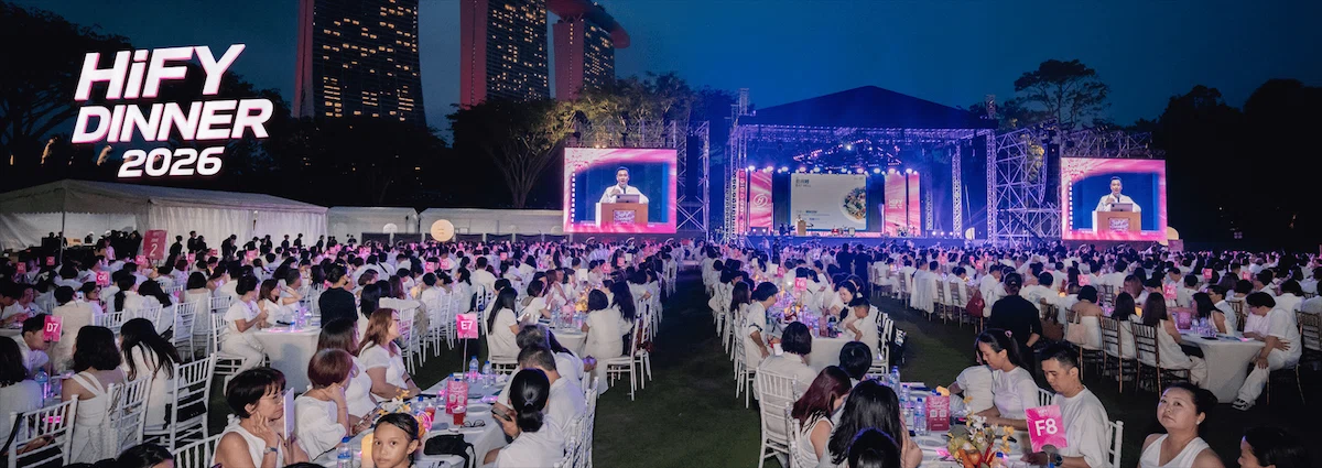 Guests in white at the HiFY Dinner 2026 health and wellness carnival at Gardens by the Bay