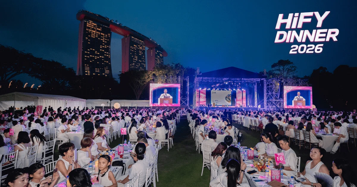 Guests in white at the HiFY Dinner 2026 health and wellness carnival at Gardens by the Bay
