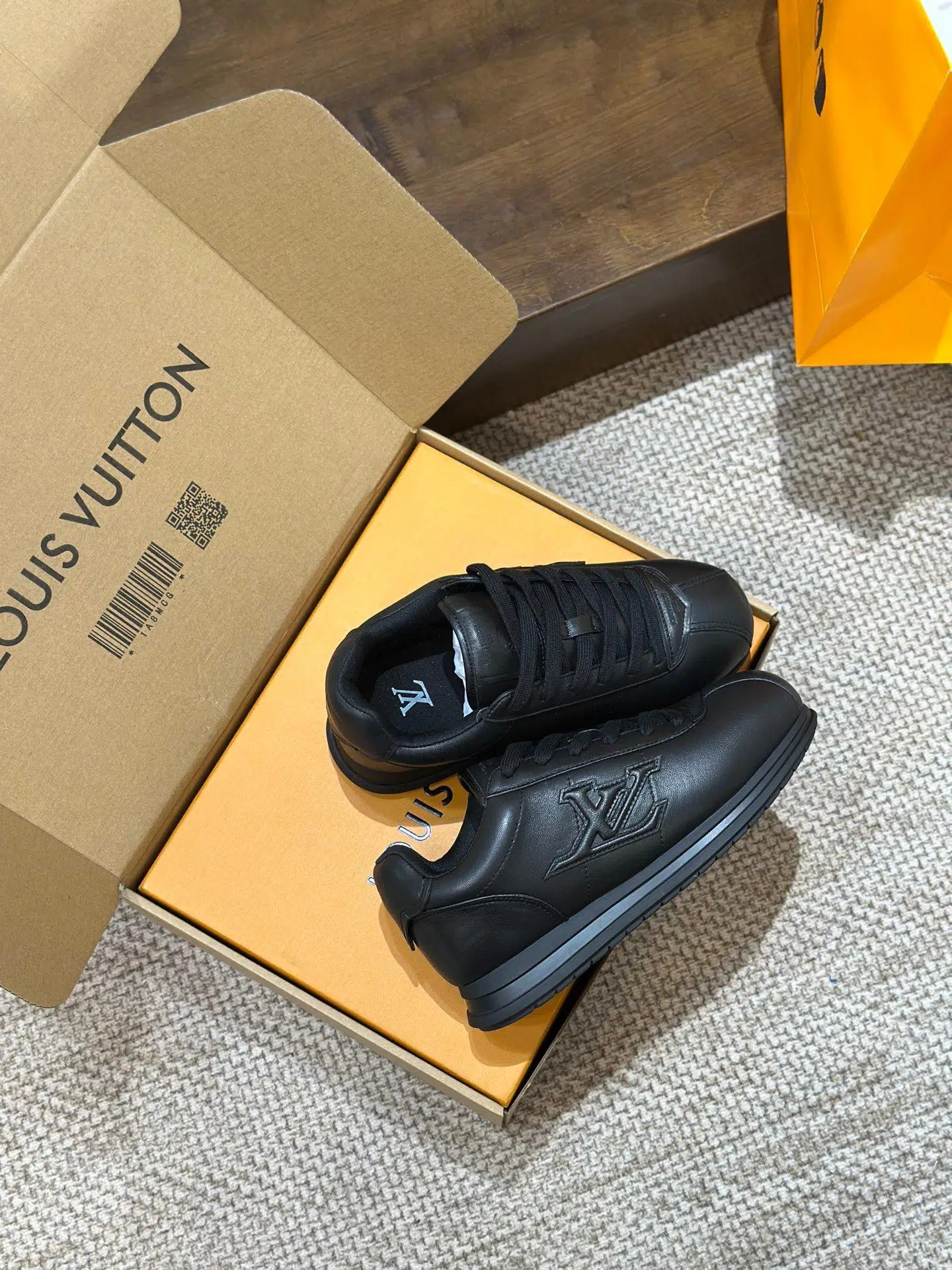 Designer fashion sneakers and casual footwear display