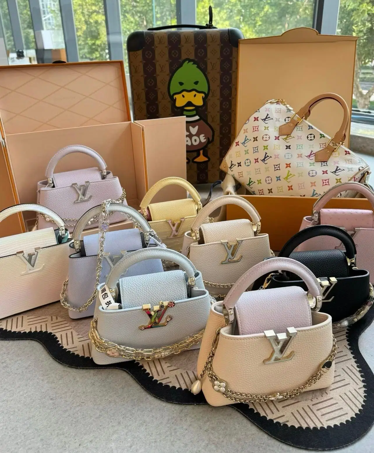 Assorted leather handbags with boxes